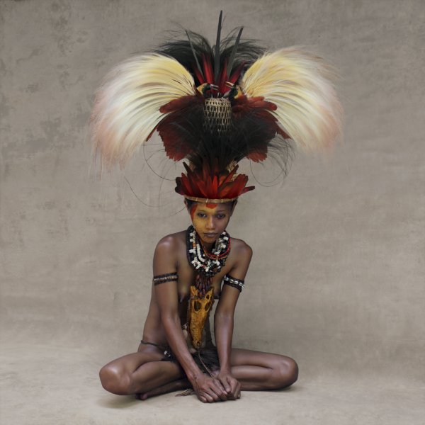 Young Woman With Feather Headpiece, New Guinea by Fred Stichnoth