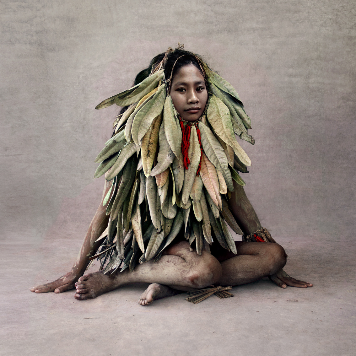 Young Woman In Leaf Costume, New Guinea by Fred Stichnoth