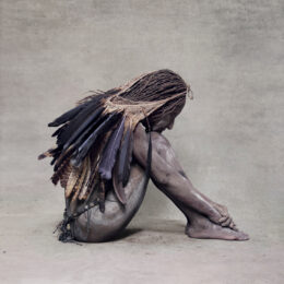 Woman With Feather Bag, New Guinea by Fred Stichnoth at Addicted Art Gallery