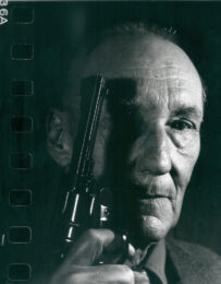 William S. Burroughs With Gun by Gottfried Helnwein at Emanuel von Baeyer - Cabinet