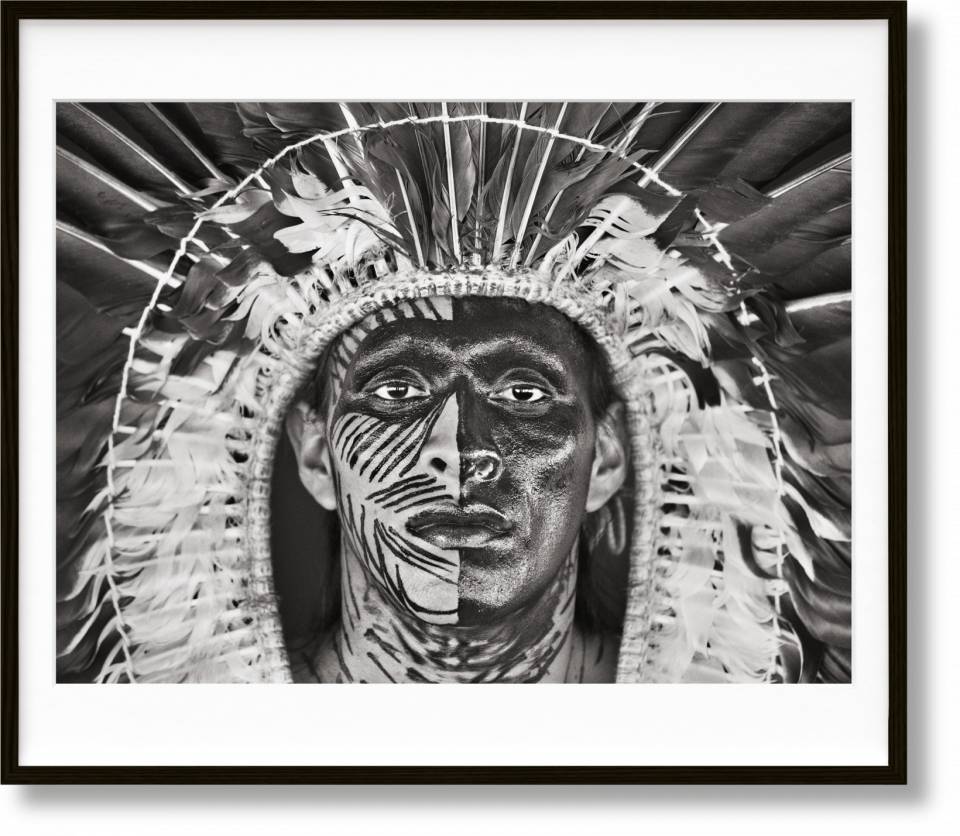 Amazônia. Art Edition No. 1–100 ‘Adão Yawanawá in a headdress of eagle feathers’ by Sebastião Salgado