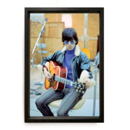 Keith Richards tuning up his Gibson Hummingbird by Gered Mankowitz at RedHouse Gallery