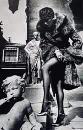 Woman in Coat Adjusting Stocking, Paris 1975 by Helmut Newton at Dovehouse Contemporary