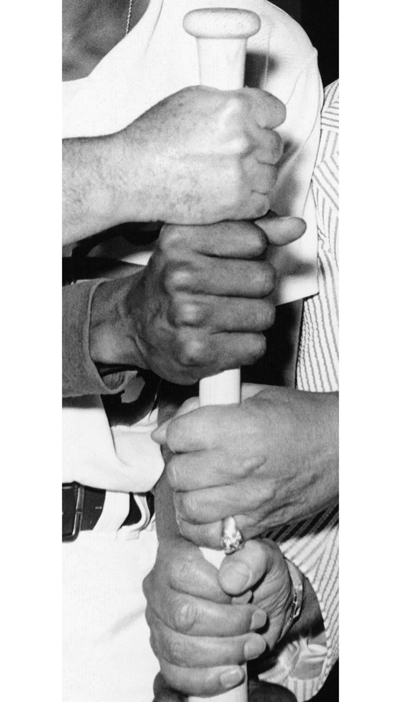 Four Hands and a Baseball Bat by John Baldessari