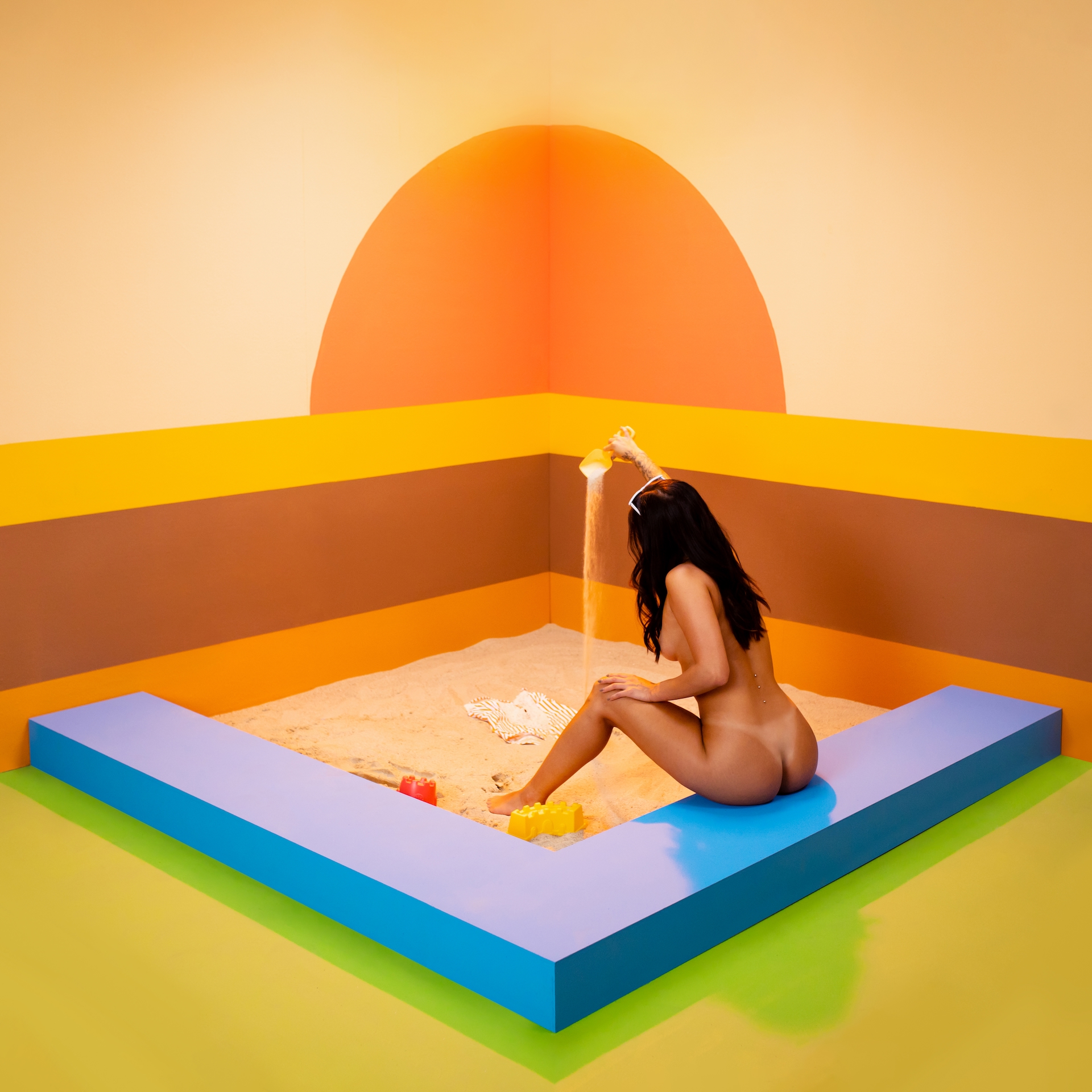 Sunset Over A Sandbox by Jada + David